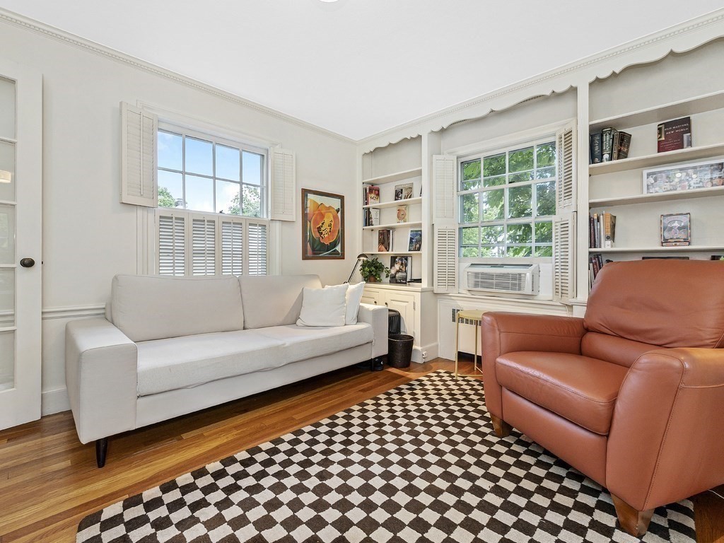 8 Monadnock Road Arlington, MA 02476 - Photo 17 of 36 a living room with furniture and a window
