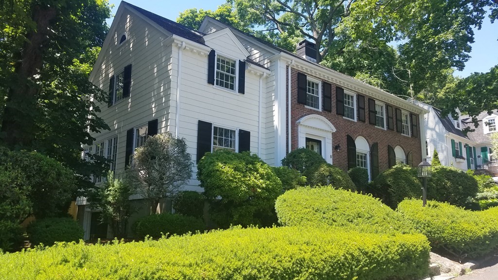 8 Monadnock Road Arlington, MA 02476 - Photo 2 of 36 a front view of a house with a yard and potted plants