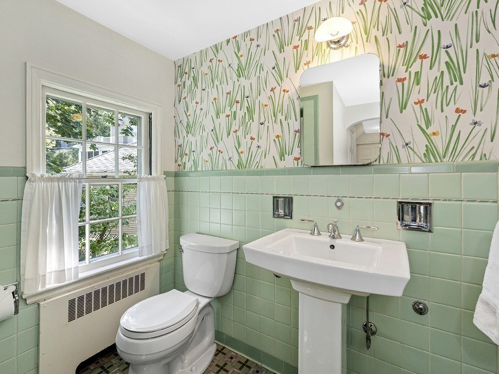 8 Monadnock Road Arlington, MA 02476 - Photo 21 of 36 a bathroom with a sink toilet and mirror