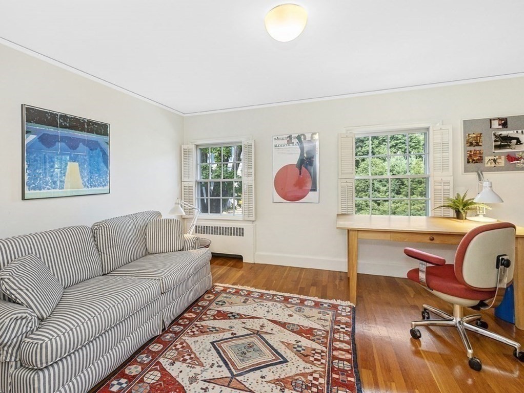 8 Monadnock Road Arlington, MA 02476 - Photo 24 of 36 a living room with furniture and a window