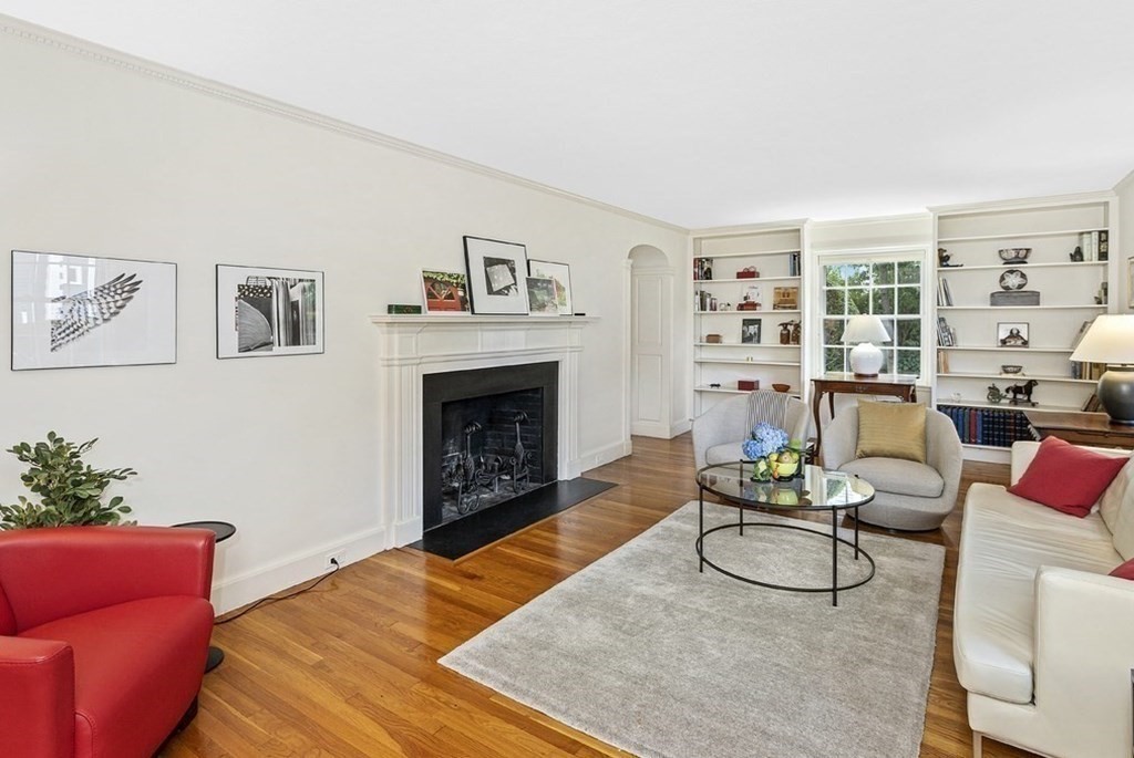 8 Monadnock Road Arlington, MA 02476 - Photo 5 of 36 a living room with furniture and a fireplace