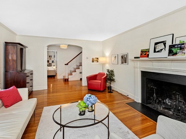 8 Monadnock Road Arlington, MA 02476 - Photo 6 of 36 a living room with furniture and a fireplace