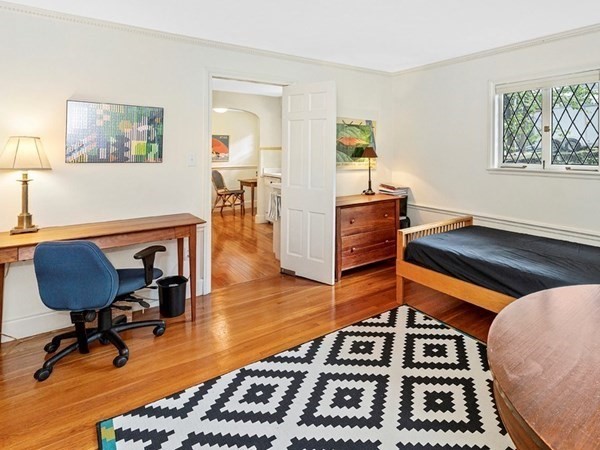 8 Monadnock Road Arlington, MA 02476 - Photo 7 of 36 a bedroom with furniture and a rug