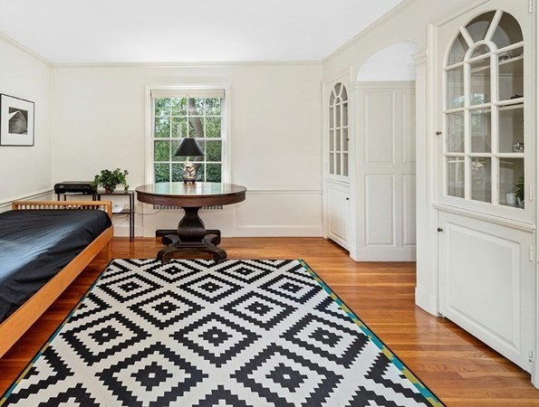 8 Monadnock Road Arlington, MA 02476 - Photo 8 of 36 a living room with a rug and a window