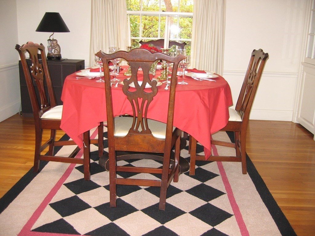 8 Monadnock Road Arlington, MA 02476 - Photo 10 of 36 a view of a dining room with furniture and wooden floor