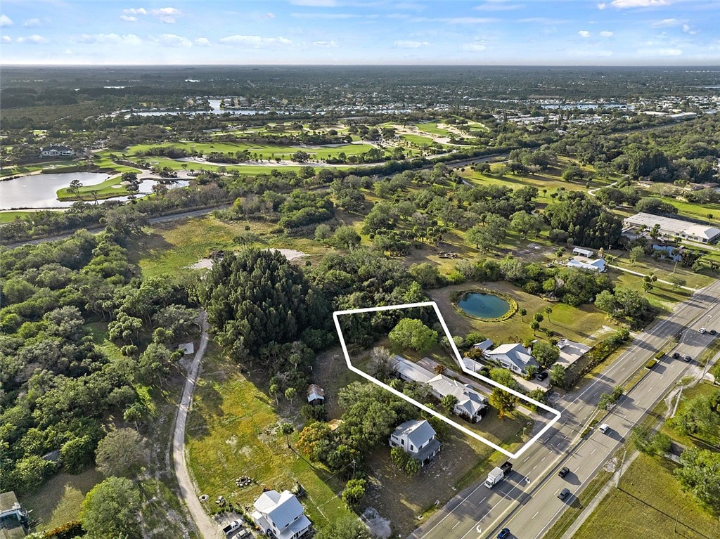 9115 Highway 1 Sebastian, FL 32958 - Photo 1 of 34 an aerial view of residential houses with outdoor space