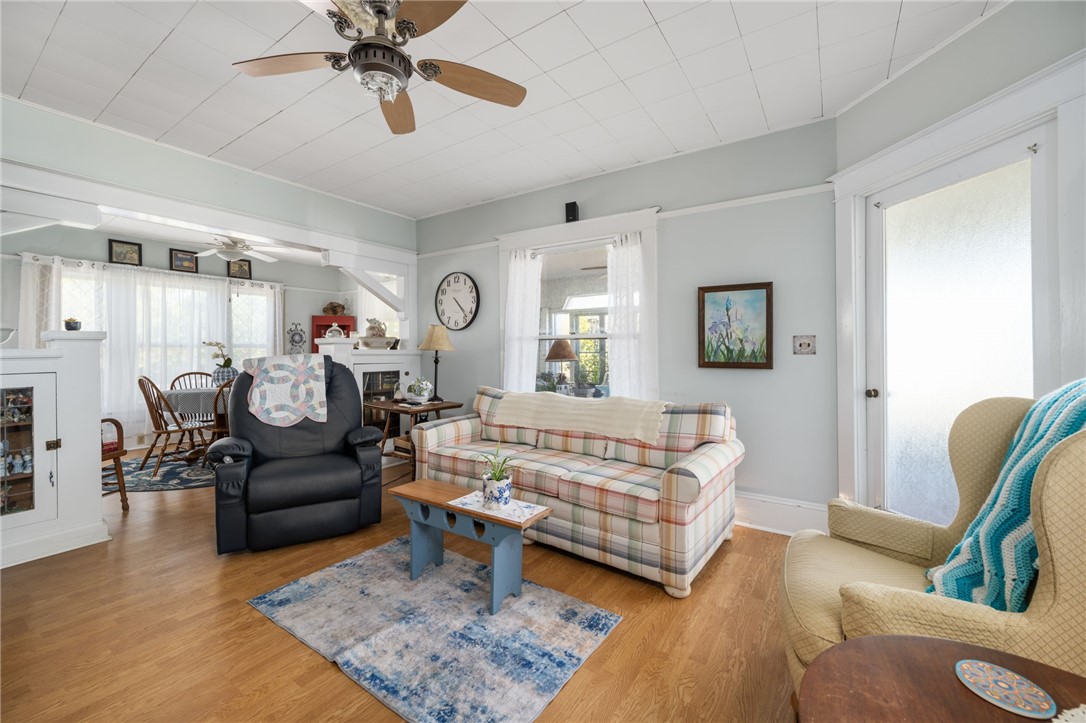 9115 Highway 1 Sebastian, FL 32958 - Photo 12 of 34 a living room with furniture and a wooden floor