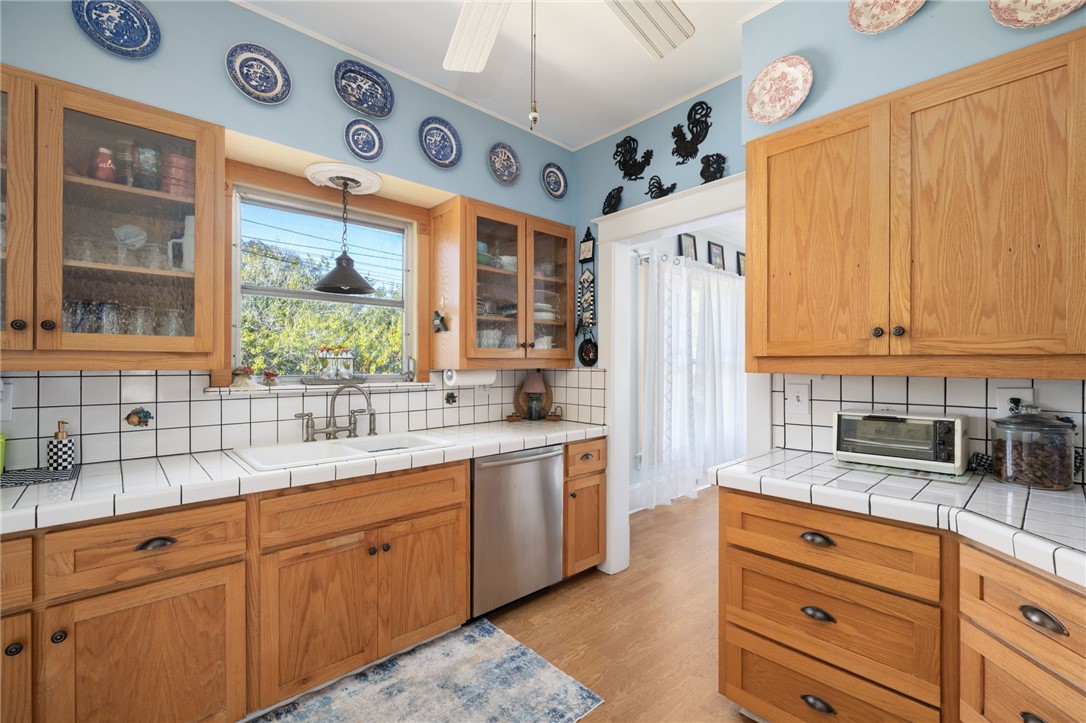 9115 Highway 1 Sebastian, FL 32958 - Photo 13 of 34 a kitchen with stainless steel appliances granite countertop a sink and cabinets