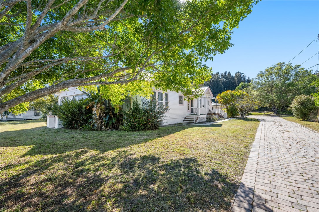 9115 Highway 1 Sebastian, FL 32958 - Photo 25 of 34 a view of a yard with an trees