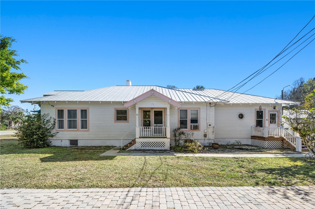 9115 Highway 1 Sebastian, FL 32958 - Photo 26 of 34 a view of house with a yard