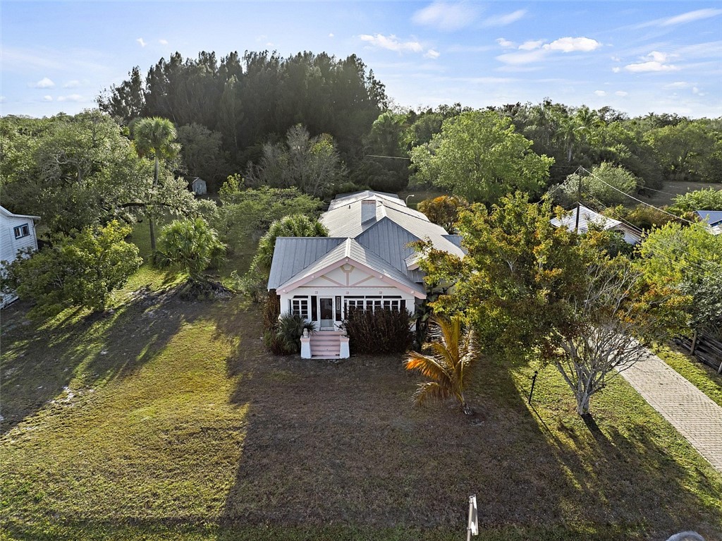 9115 Highway 1 Sebastian, FL 32958 - Photo 3 of 34 a view of a house with a yard
