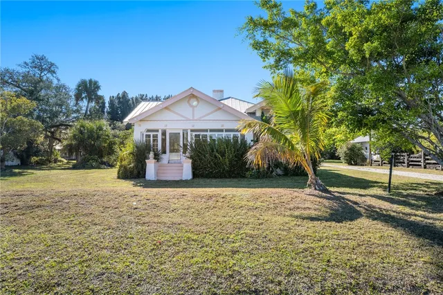 a house with trees in the background