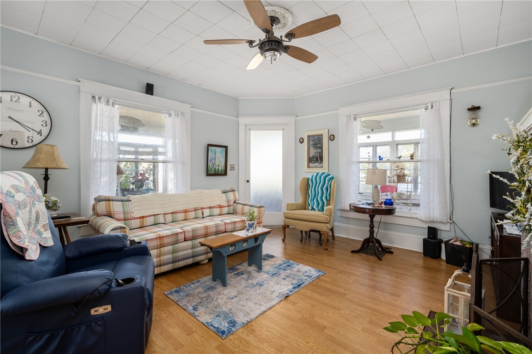 9115 Highway 1 Sebastian, FL 32958 - Photo 10 of 34 a living room with furniture a rug and a window