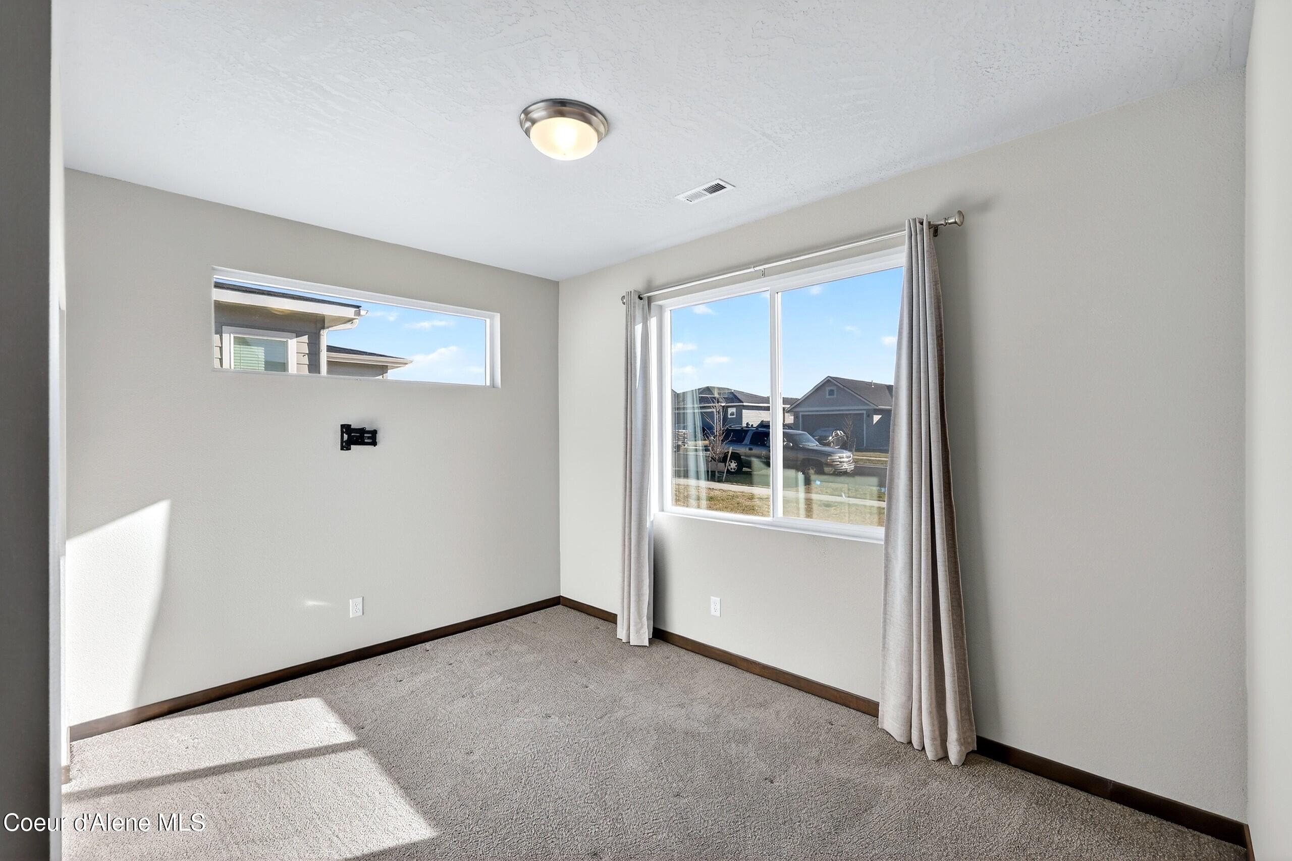 193 Inkwood Street Post Falls, ID 83854 - Photo 16 of 47 016_Guest Room 1