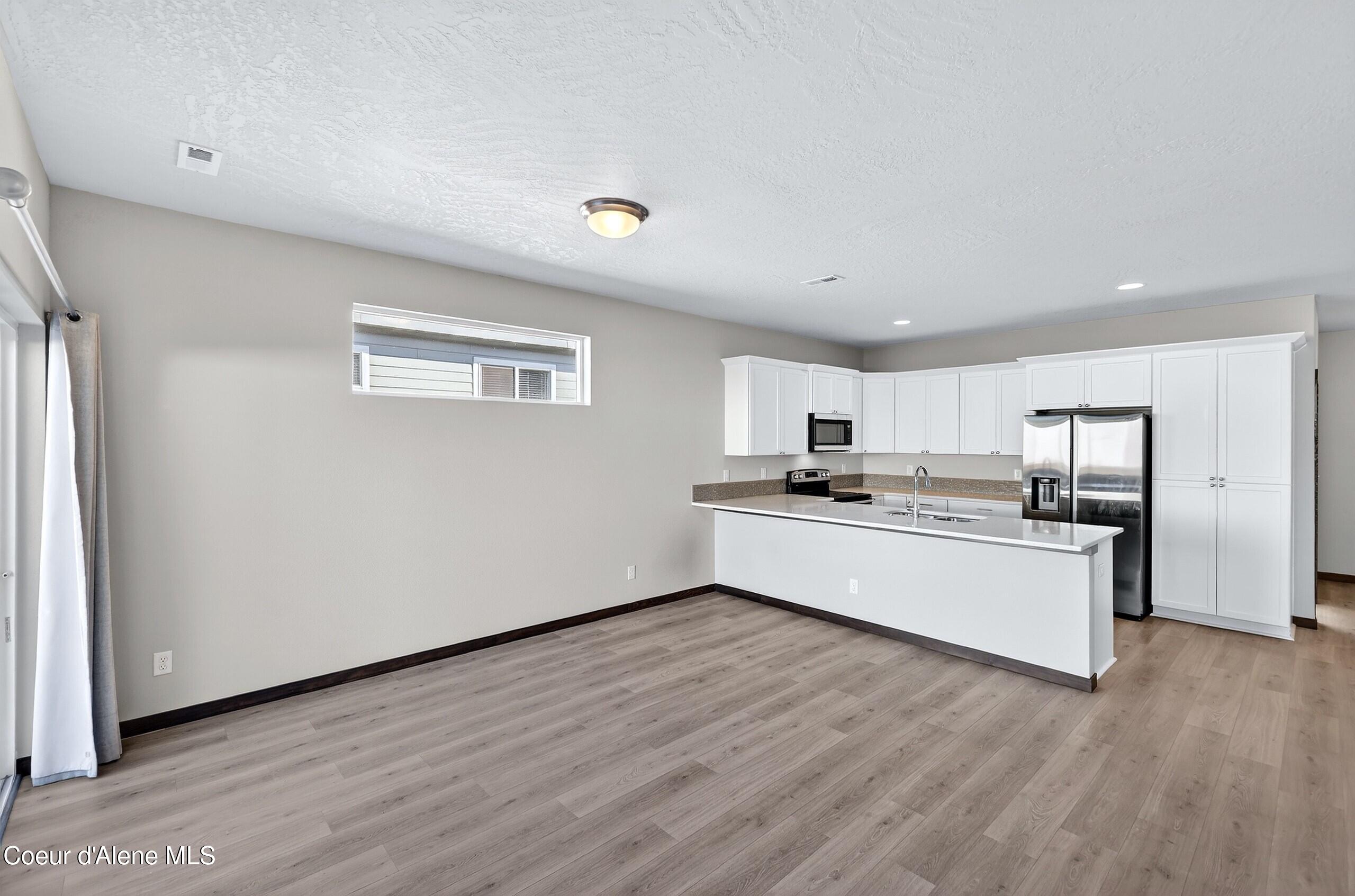 193 Inkwood Street Post Falls, ID 83854 - Photo 16 of 54 014_KitchenDining