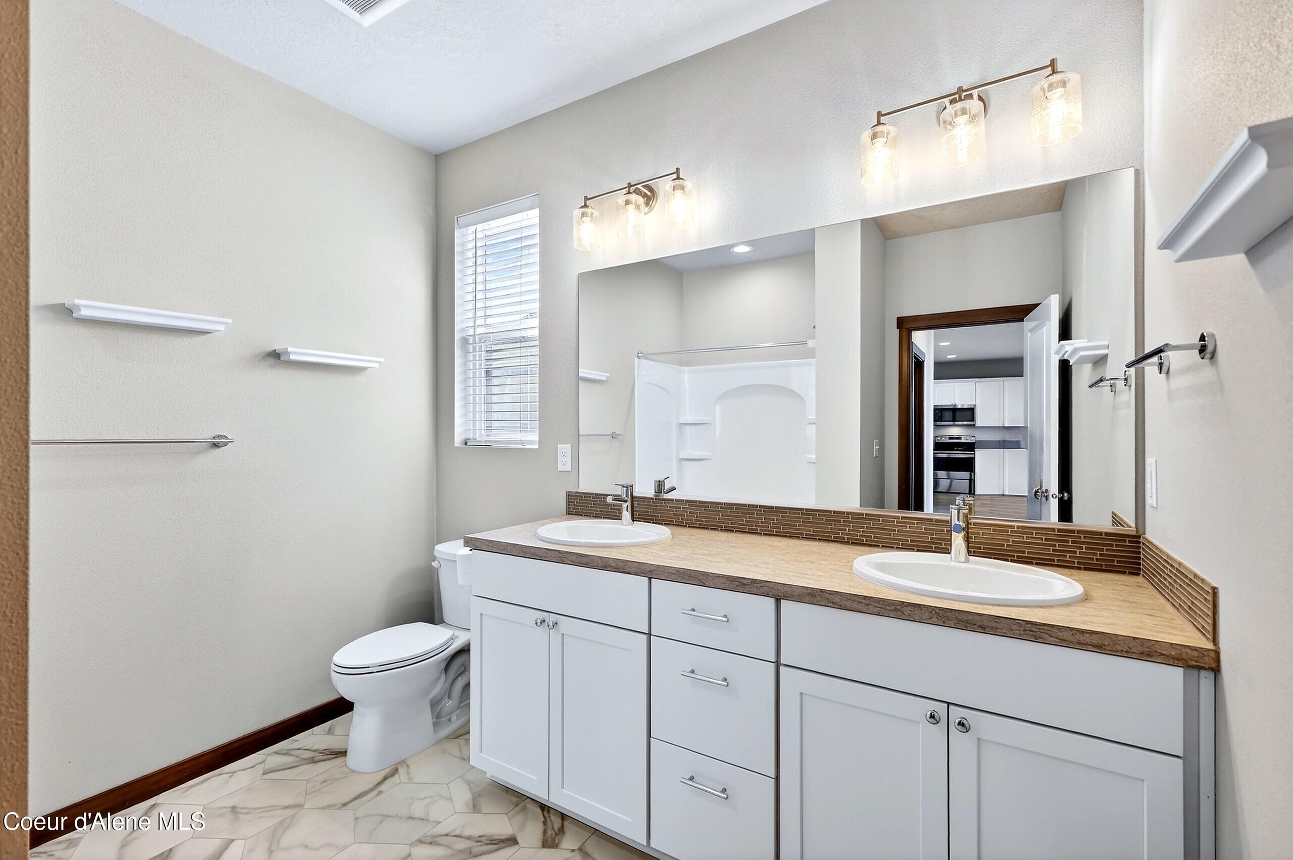 193 Inkwood Street Post Falls, ID 83854 - Photo 20 of 47 020_Guest Bath