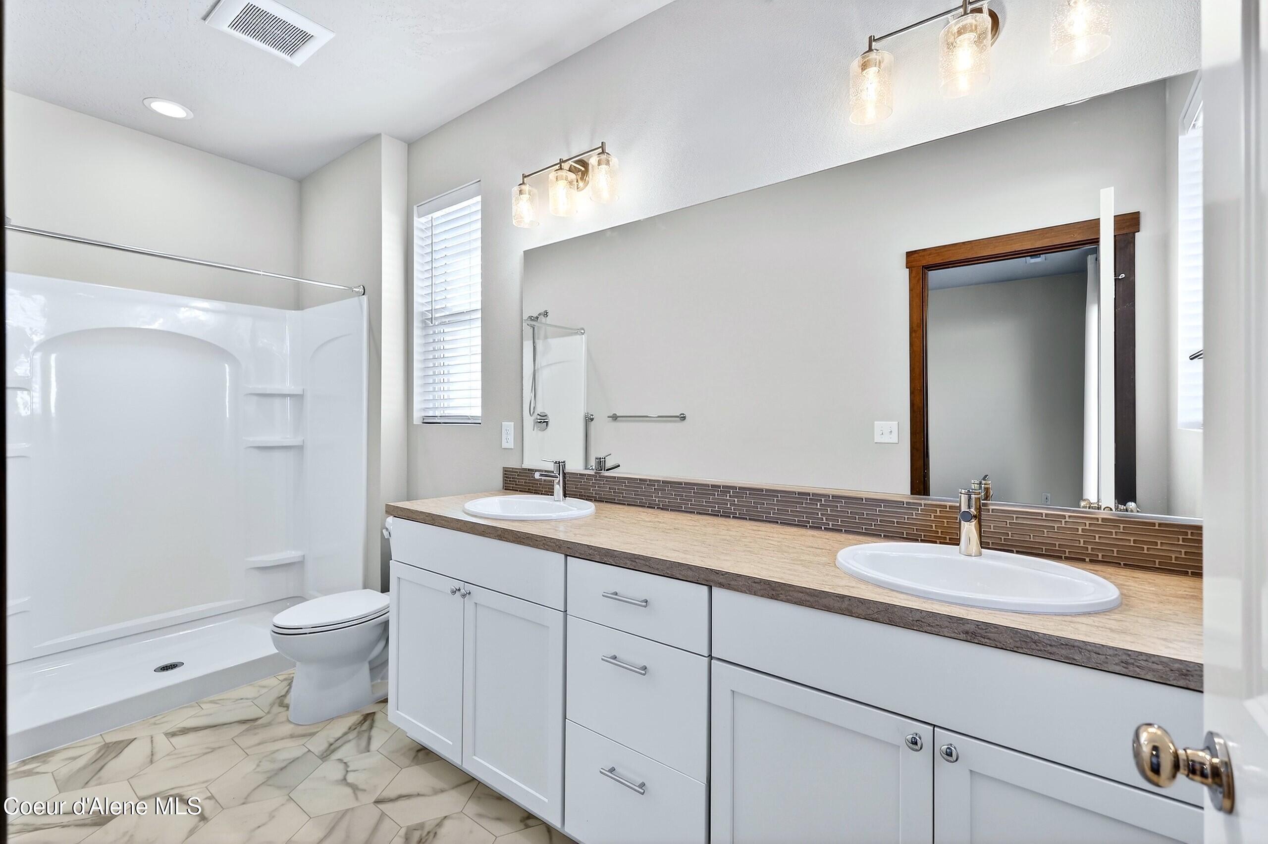 193 Inkwood Street Post Falls, ID 83854 - Photo 30 of 47 030_Primary Bathroom