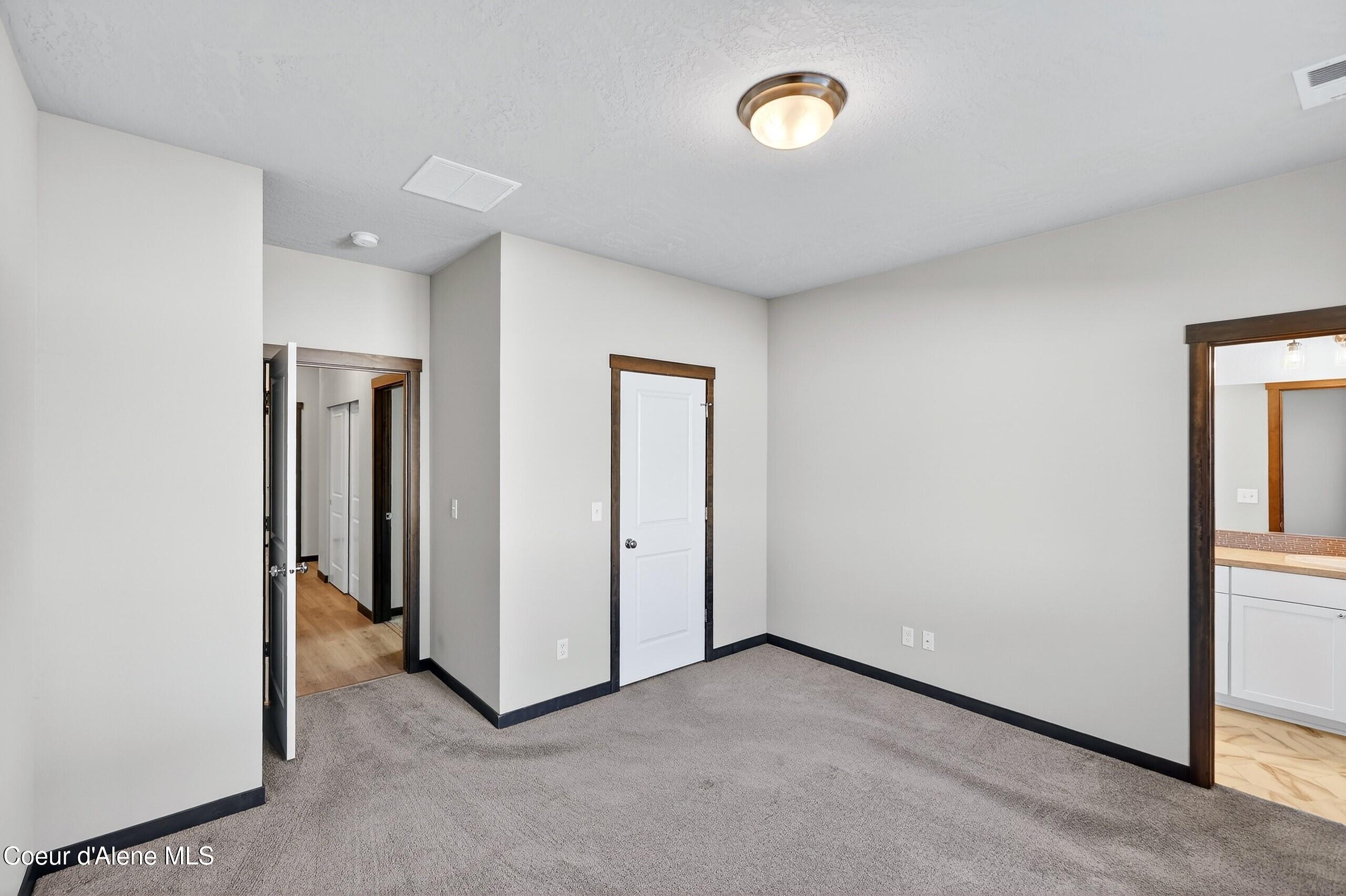 193 Inkwood Street Post Falls, ID 83854 - Photo 30 of 54 028_Primary Bedroom
