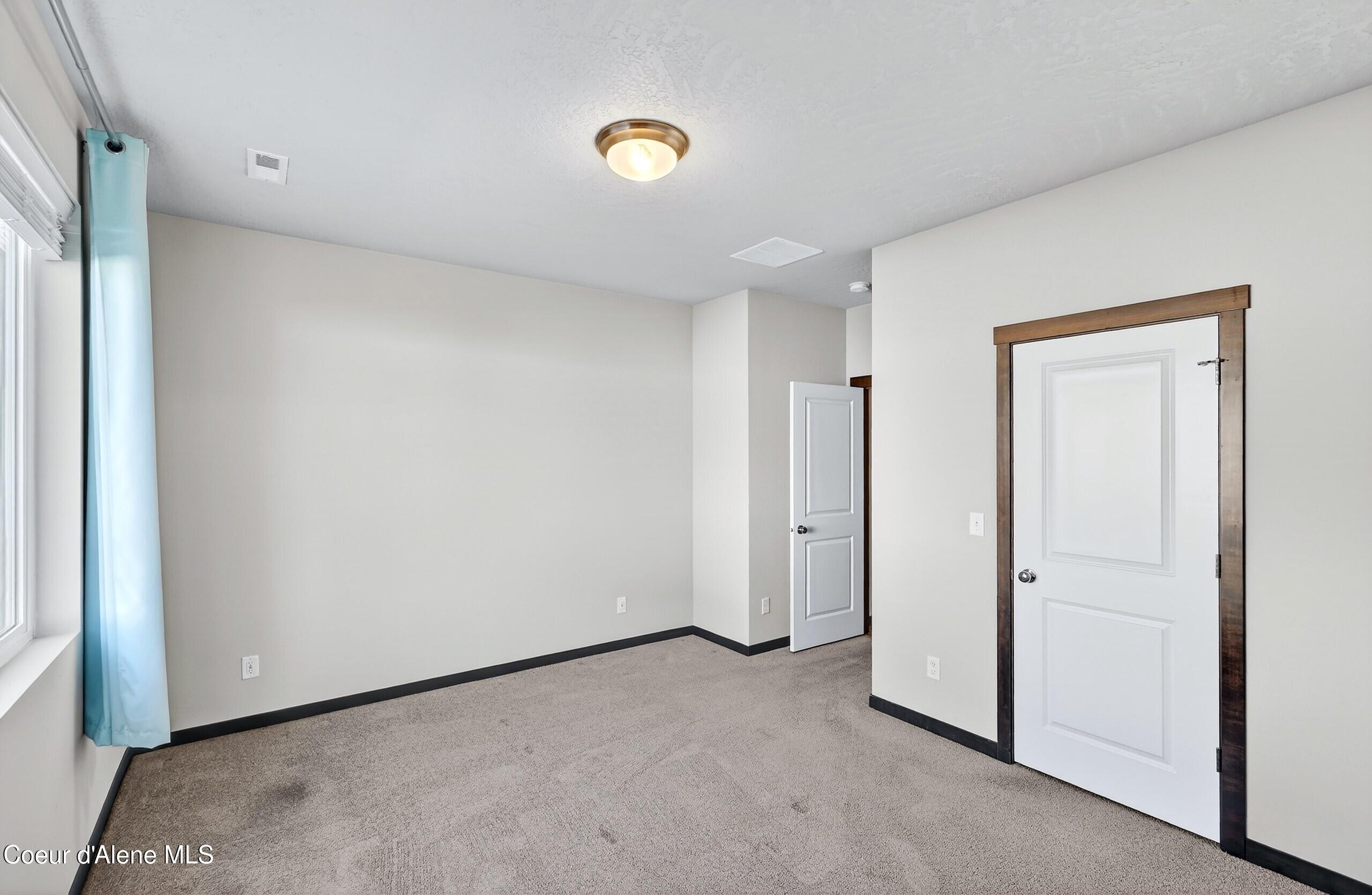 193 Inkwood Street Post Falls, ID 83854 - Photo 31 of 54 029_Primary Bedroom