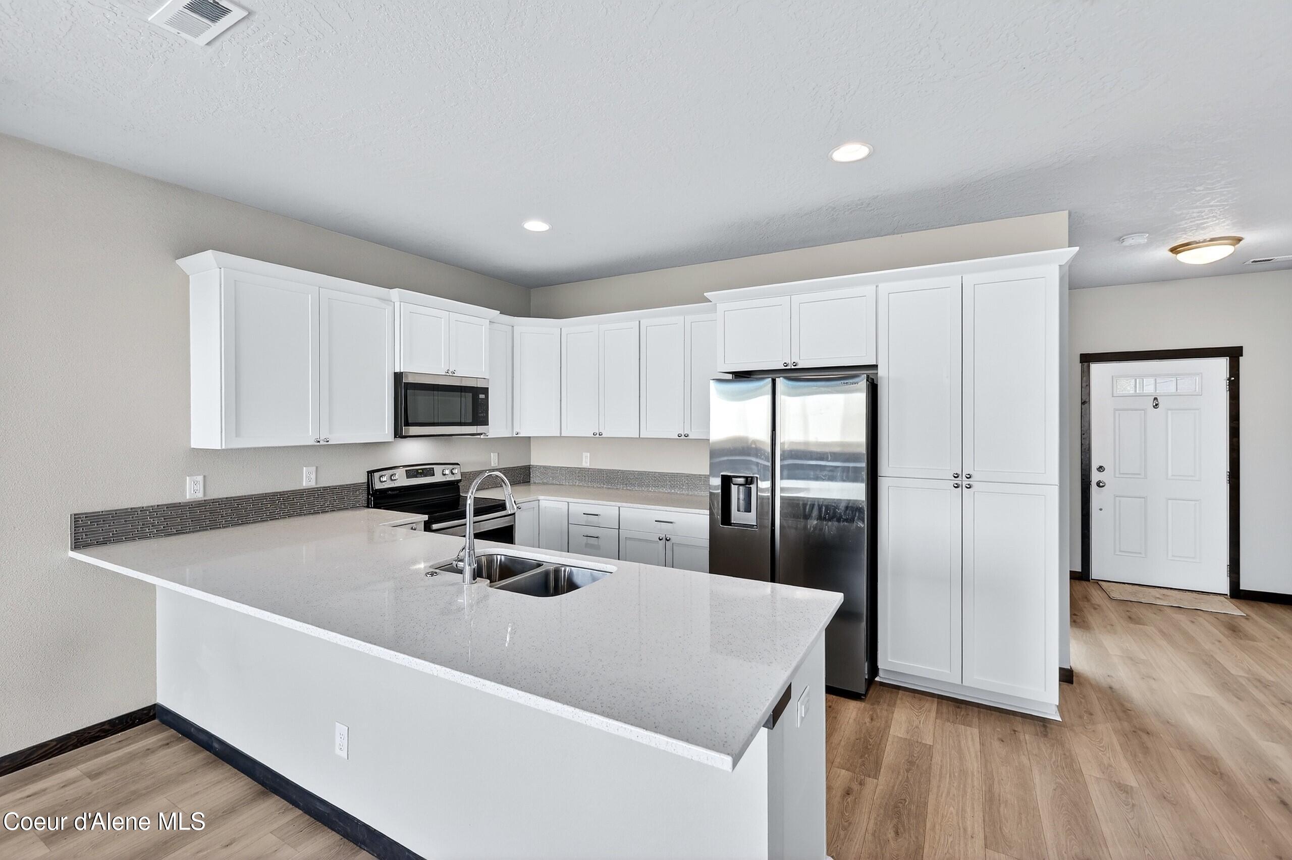 193 Inkwood Street Post Falls, ID 83854 - Photo 8 of 54 006_Kitchen