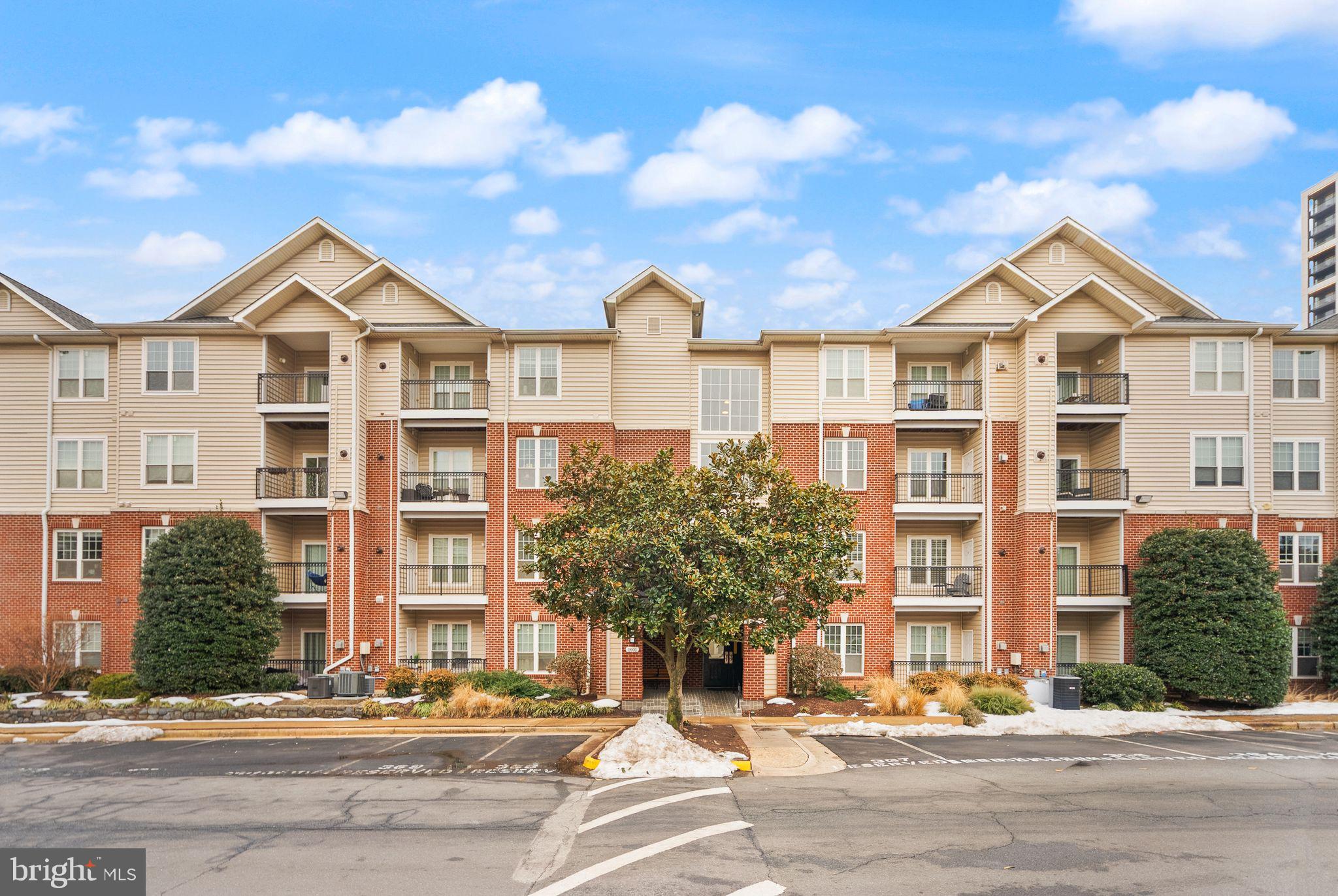 1601 Spring Gate Dr., Unit 1116 McLean, VA 22102 - Photo 4 of 26 a front view of a building
