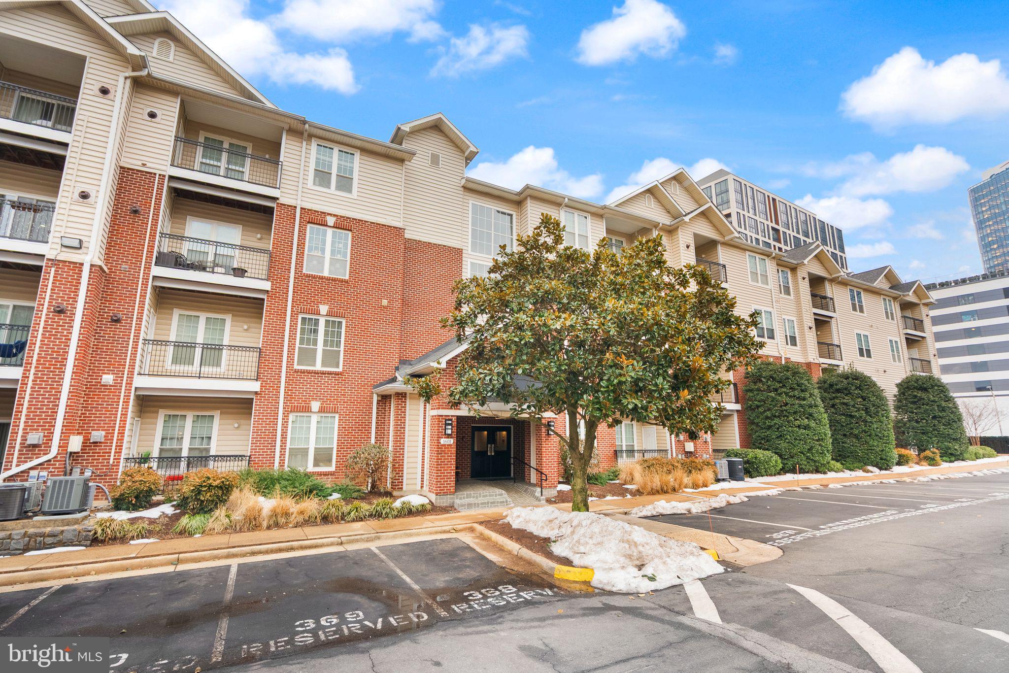 1601 Spring Gate Dr., Unit 1116 McLean, VA 22102 - Photo 7 of 26 a view of a building with a street