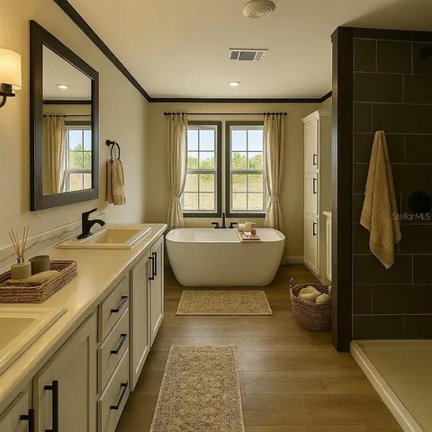 a spacious bathroom with a double vanity sink a mirror and a bathtub