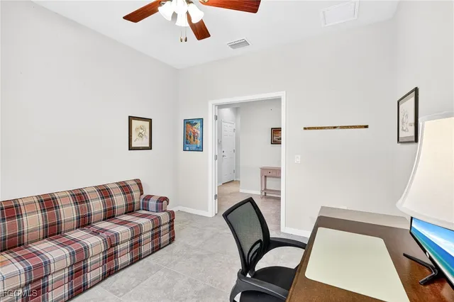 a bedroom with bed and window