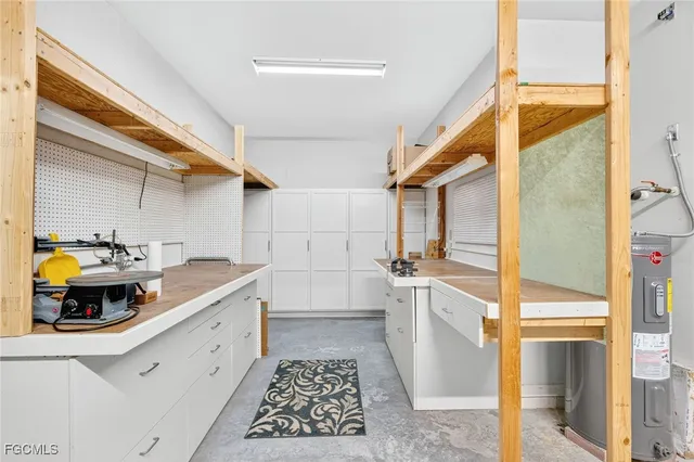a view of a house with a big yard and potted plants