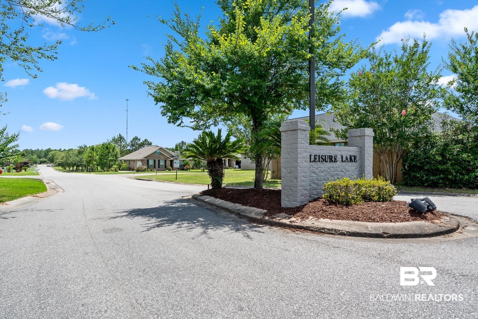 22764 Respite Lane Foley, AL 36535 - Photo 45 of 46 View of asphalt road featuring curbs