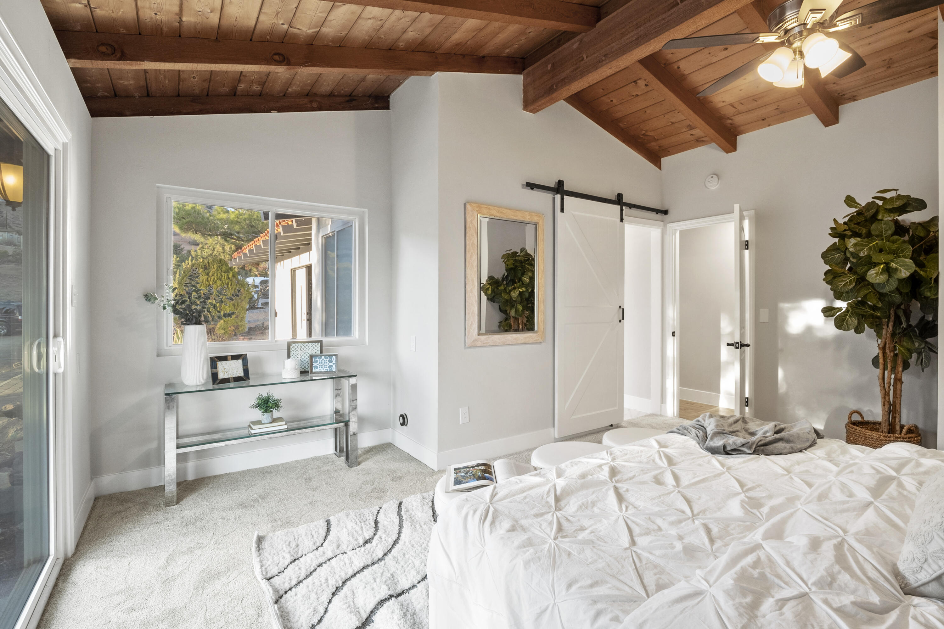 1530 Crestview Trail Acton, CA 93510 - Photo 14 of 43 a bedroom with a large bed and a window