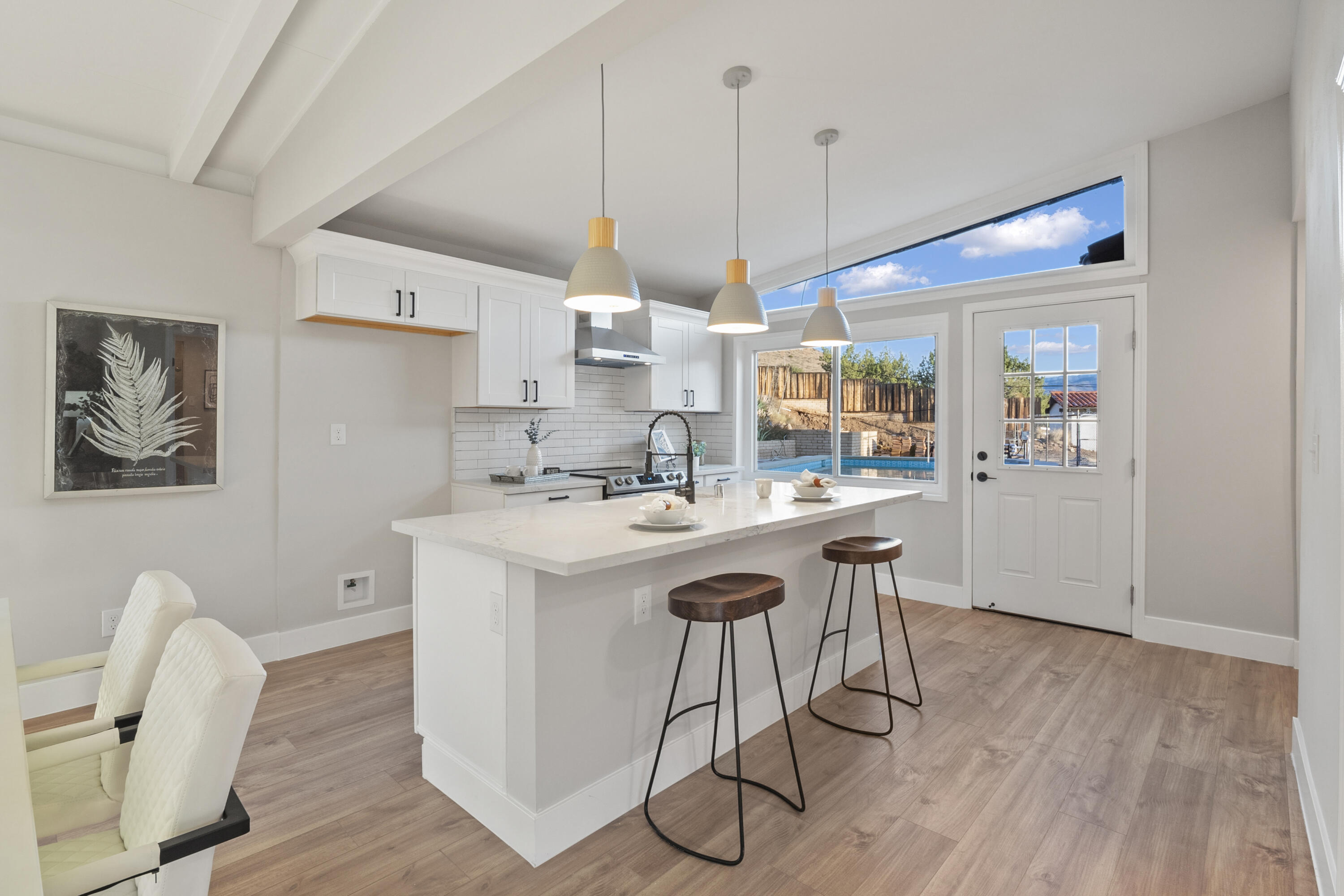 1530 Crestview Trail Acton, CA 93510 - Photo 18 of 43 a kitchen with stainless steel appliances granite countertop a sink a stove a refrigerator and island with wooden floor