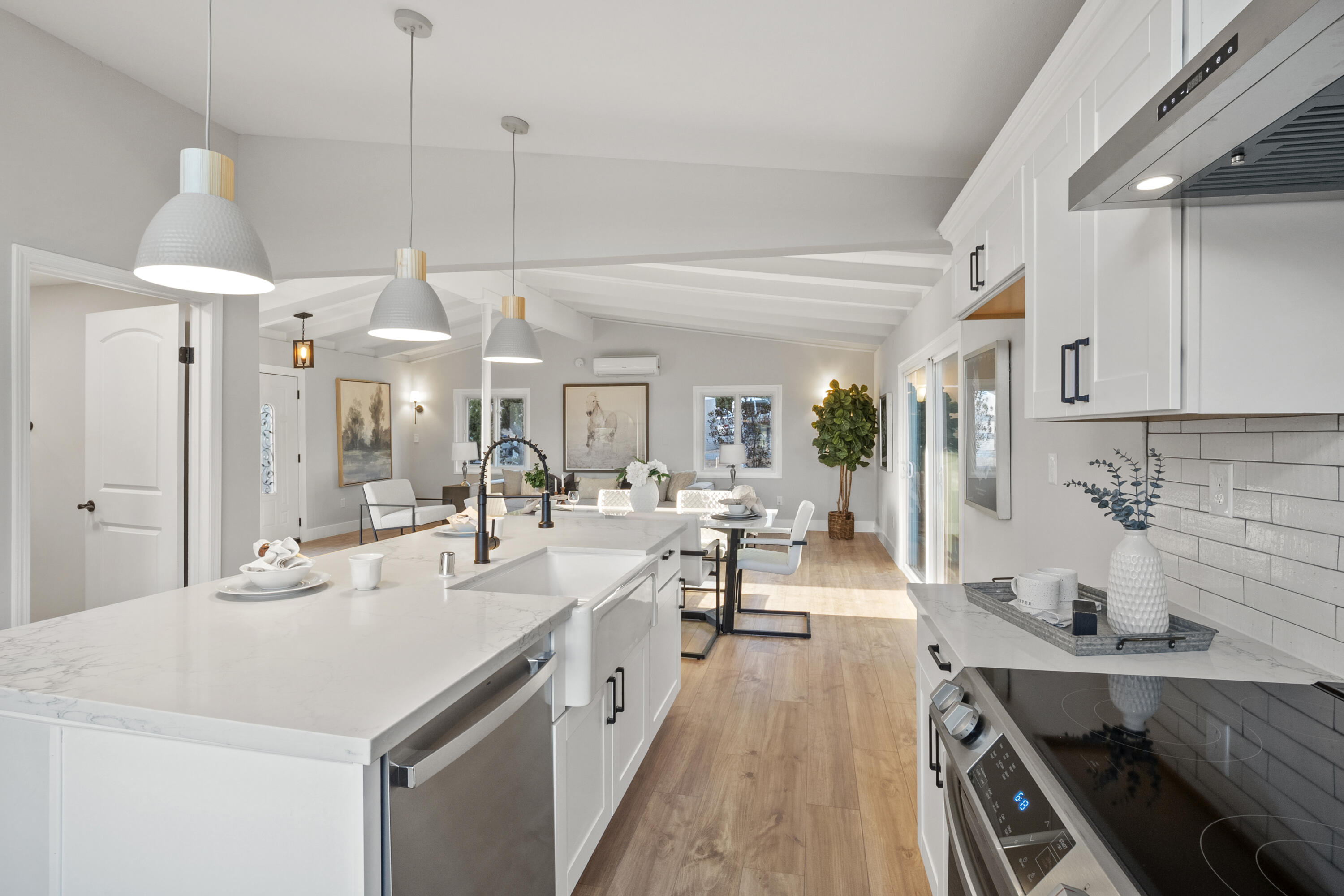 1530 Crestview Trail Acton, CA 93510 - Photo 20 of 43 a large kitchen with kitchen island a stove a sink a refrigerator and a dining table view