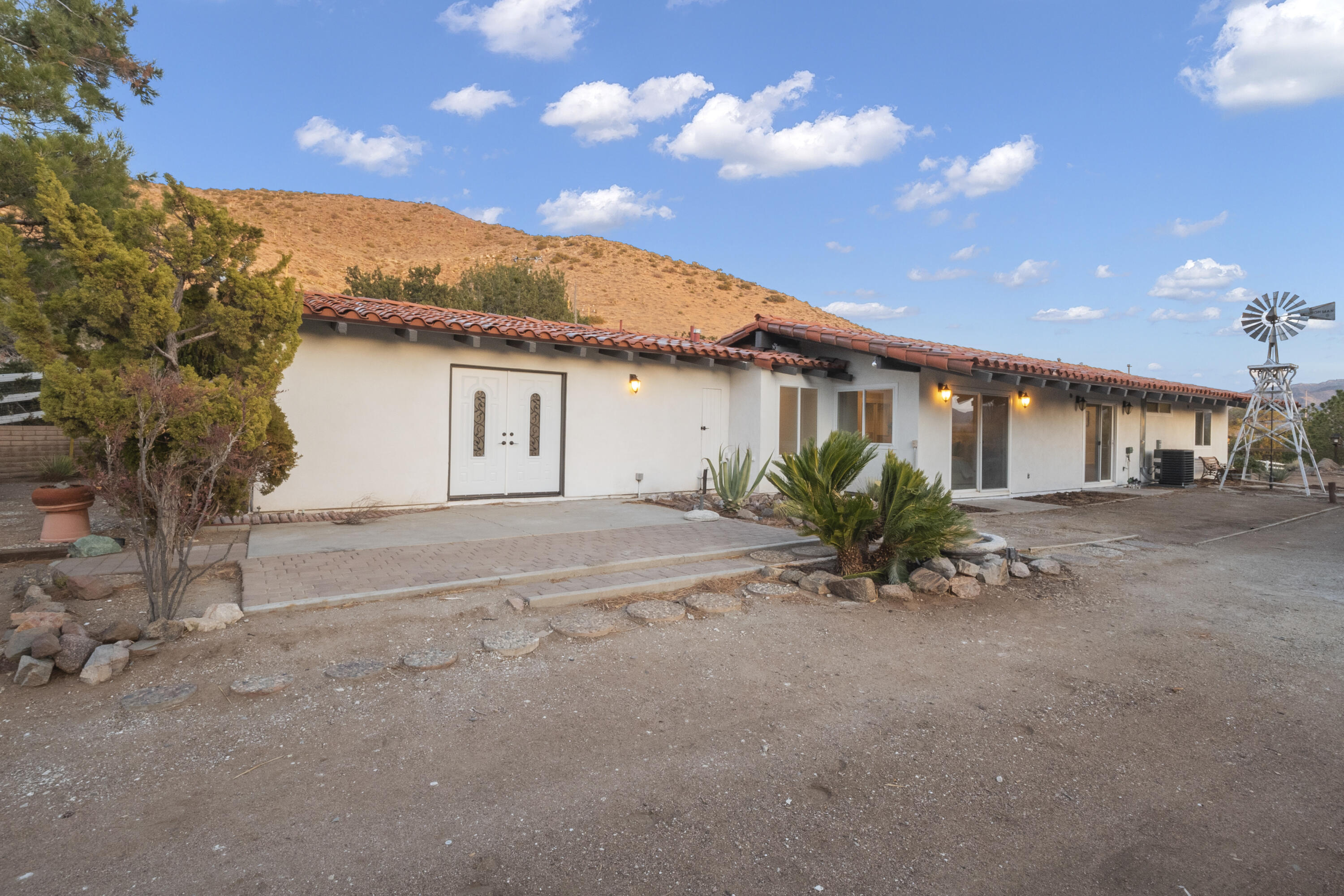 1530 Crestview Trail Acton, CA 93510 - Photo 2 of 43 a view of a house with a large tree and a big yard