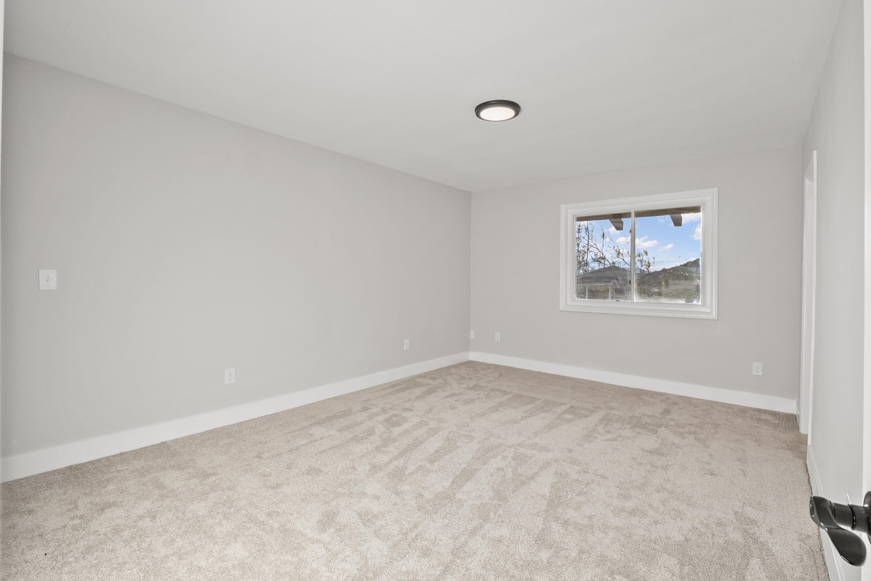 1530 Crestview Trail Acton, CA 93510 - Photo 5 of 43 an empty room with windows