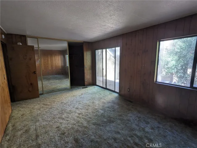 a bathroom with a sink a toilet and a shower