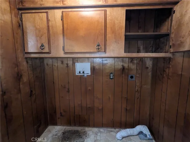 a view of an empty room with a balcony