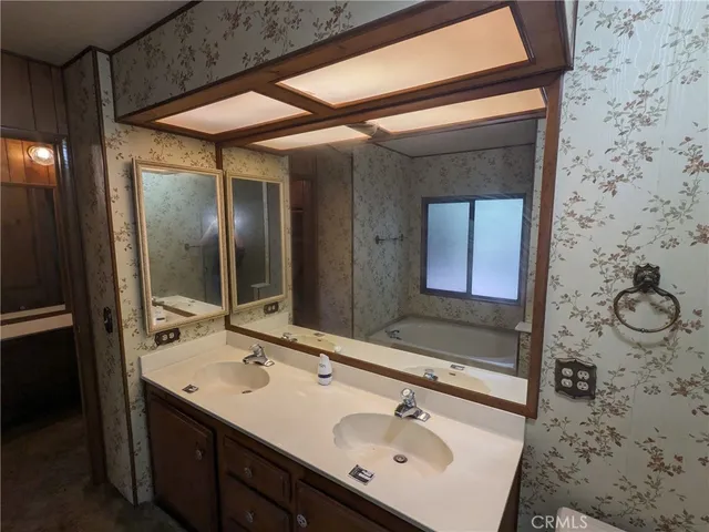 a view of a house with a tree