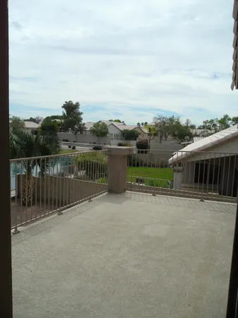 a view of a lake with a houses in the back