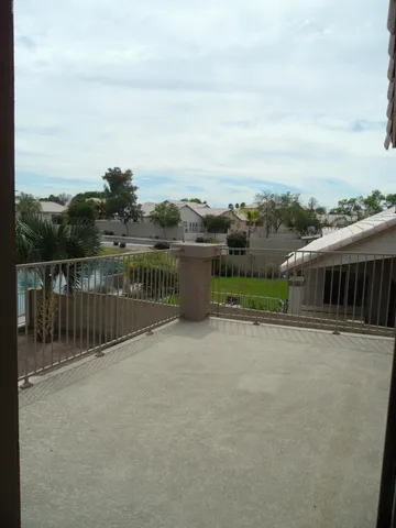 a view of a lake with a houses in the back