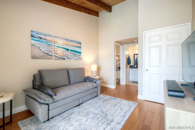 a living room with furniture and a rug