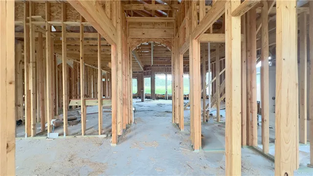 a view of a porch with a floor to ceiling window