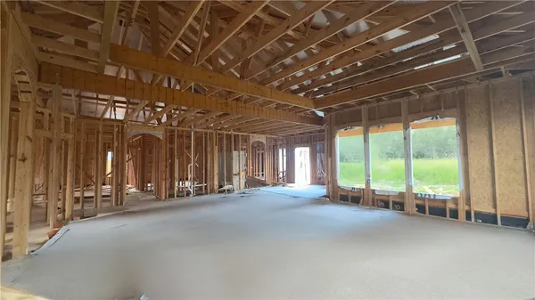 a view of a room with large windows