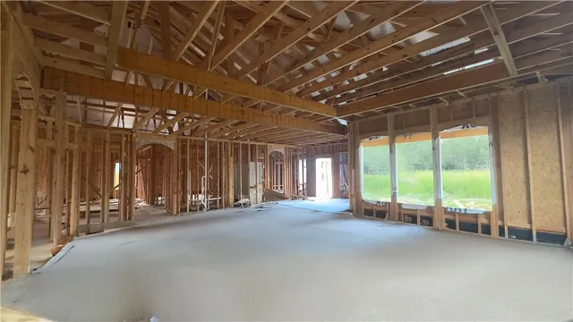 a view of a room with large windows