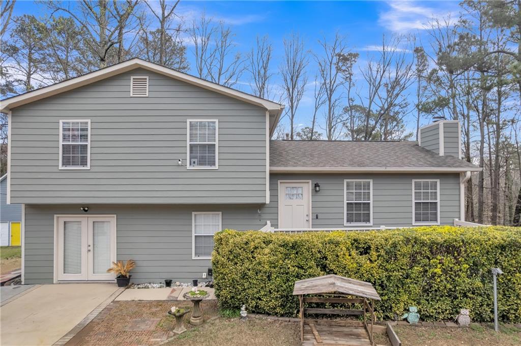 3123 Booths Court Dacula, GA 30019 - Photo 2 of 56 a front view of a house with a yard