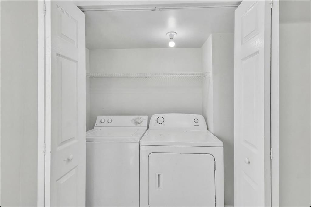 3123 Booths Court Dacula, GA 30019 - Photo 33 of 56 a utility room with dryer and washer