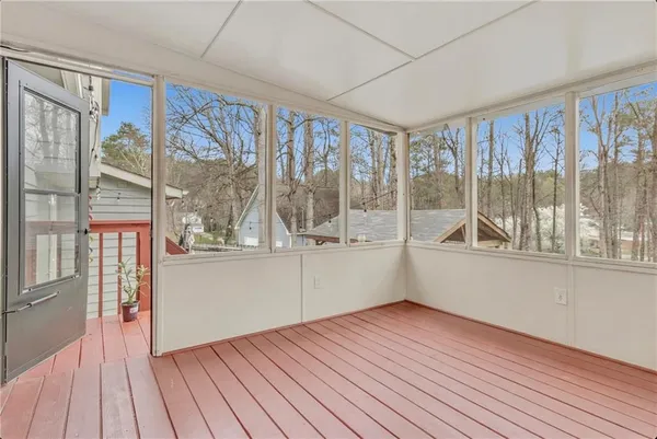 an aerial view of a house with outdoor space