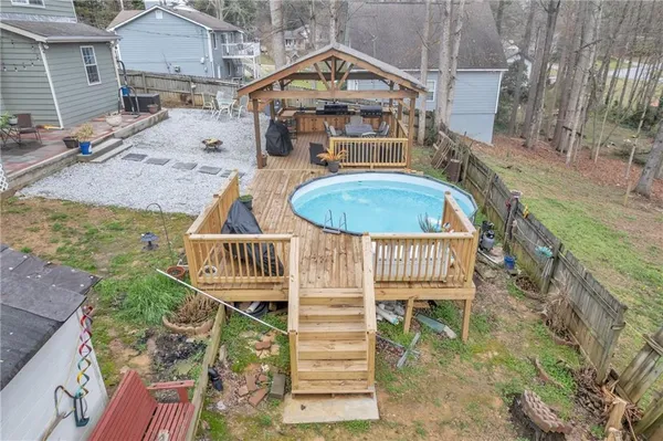 a view of swimming pool with a patio