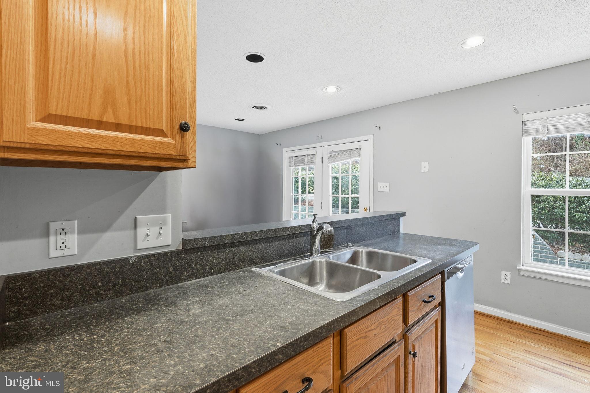 110 Rugby Place Winchester, VA 22603 - Photo 11 of 41 a kitchen with a sink and cabinets