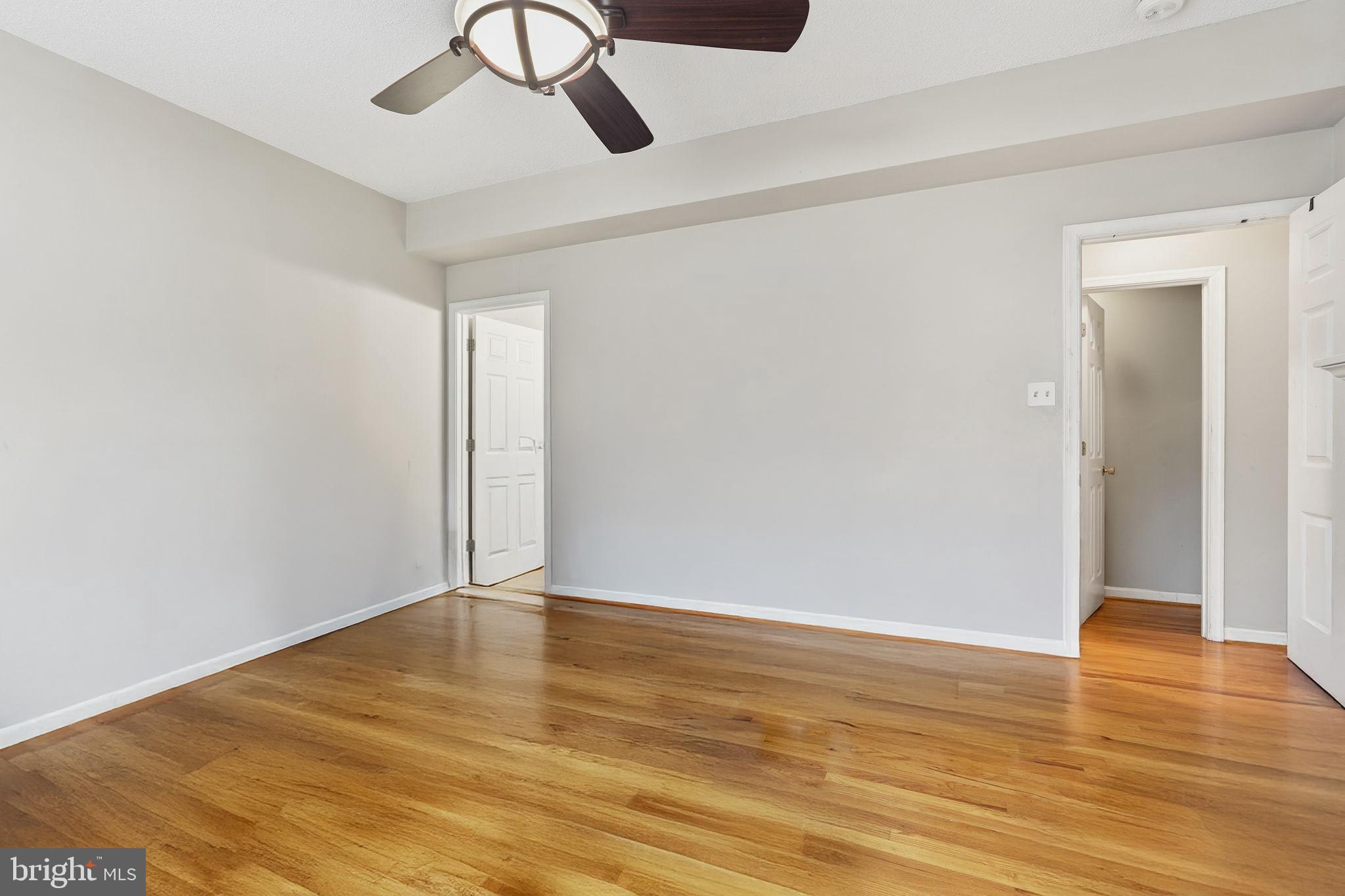 110 Rugby Place Winchester, VA 22603 - Photo 18 of 41 a view of an empty room with wooden floor